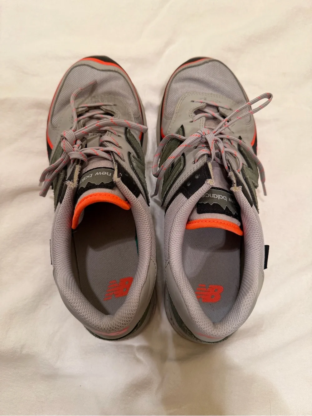 New Balance 574 Men's Sneakers in Gray with Olive and Orange Accents Rain Cloud